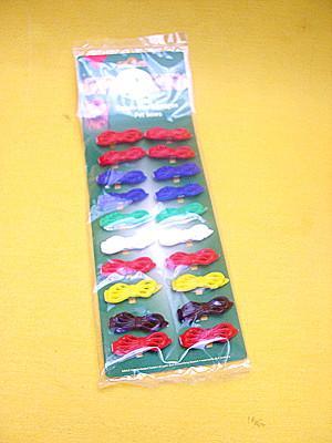 Strikjes plastic p/20 op kaart